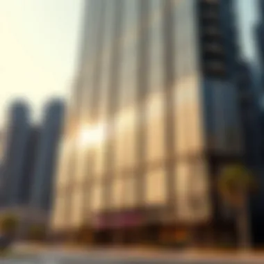 The modern facade of the Bay Gate Tower reflecting sunlight