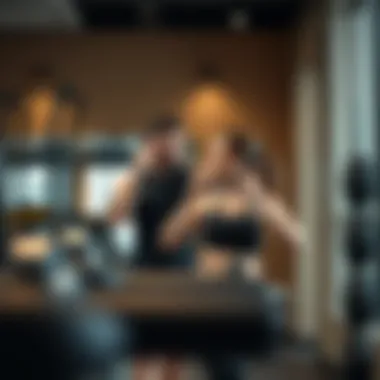 A personal trainer assisting a client with a workout in a private gym