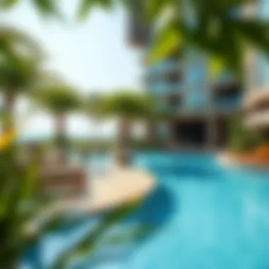 Swimming pool area with lush landscaping at Etihad Plaza