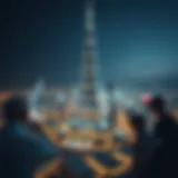 A panoramic view of the Burj Khalifa illuminated at night