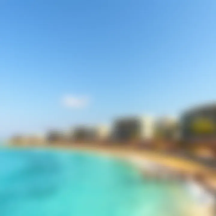 Glimpse of Mer Beach A panoramic view of Mer Beach showcasing its golden sands and pristine waters