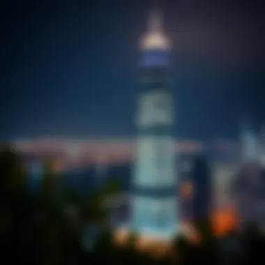 Night view of Millennium Tower illuminated, emphasizing its prominence in the city